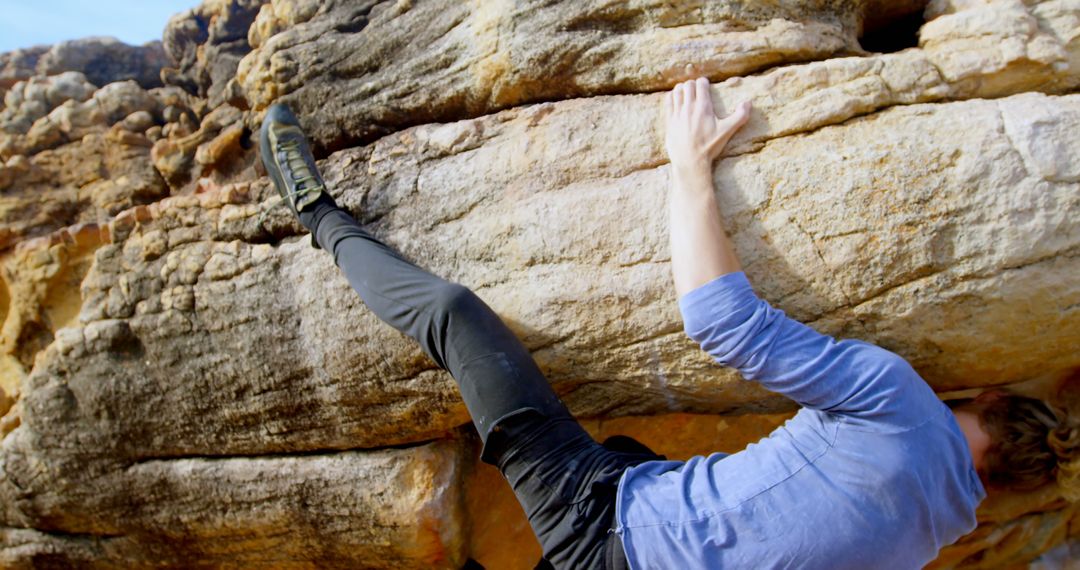 Person Bouldering on Rocky Cliff Face - Free Images, Stock Photos and Pictures on Pikwizard.com