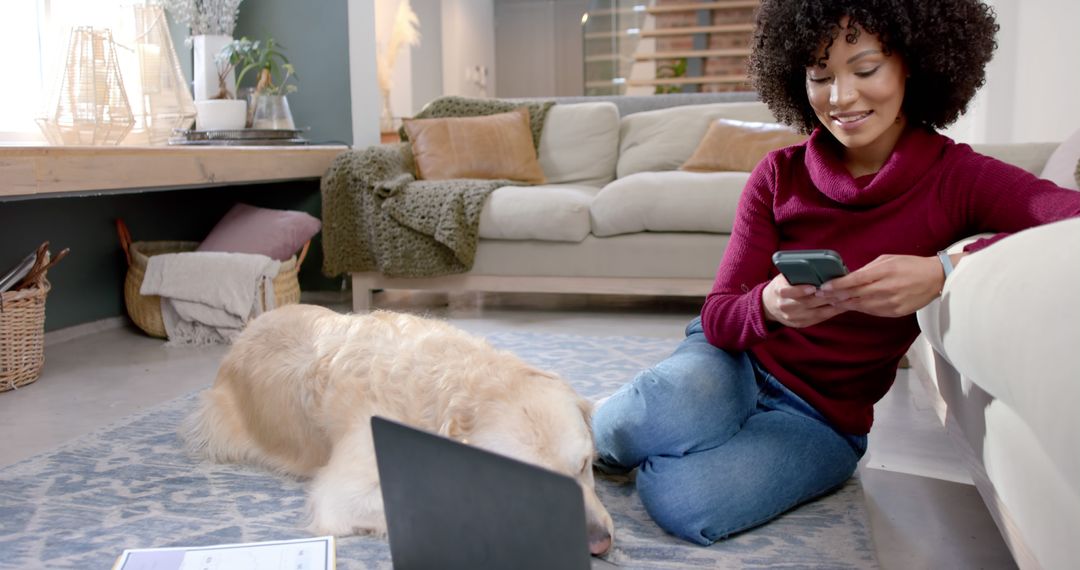 Woman Relaxing on Floor with Smartphone and Dog - Free Images, Stock Photos and Pictures on Pikwizard.com