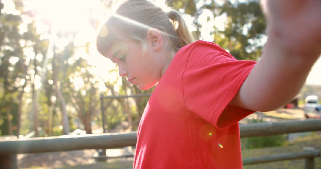 Sun-Kissed Child Embracing Outdoor Adventure in Red Shirt - Free Images, Stock Photos and Pictures on Pikwizard.com