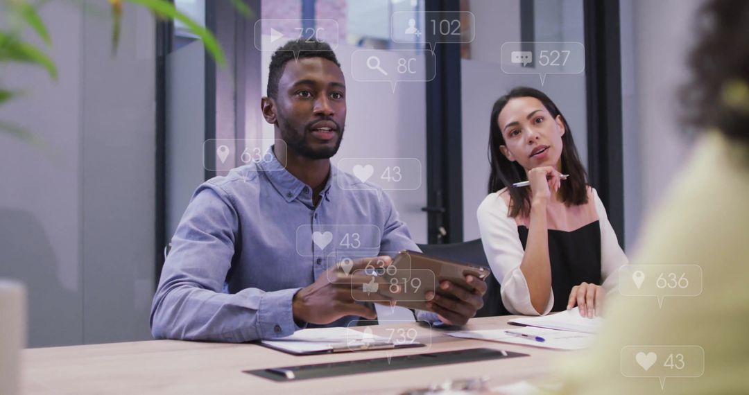 Diverse Team Analyzing Social Data in Modern Office