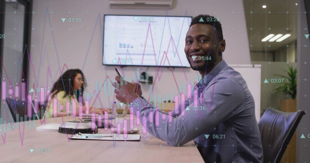 Smiling Businessman Analyzing Financial Data in Modern Office