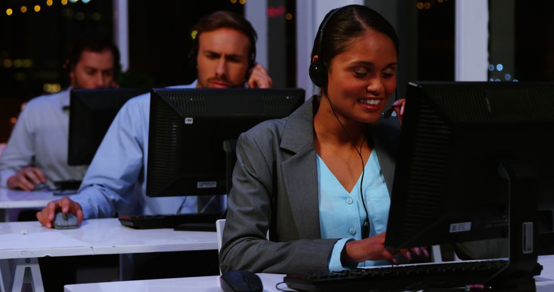 Multicultural Call Center Team in Night Shift Engaged in Customer Service