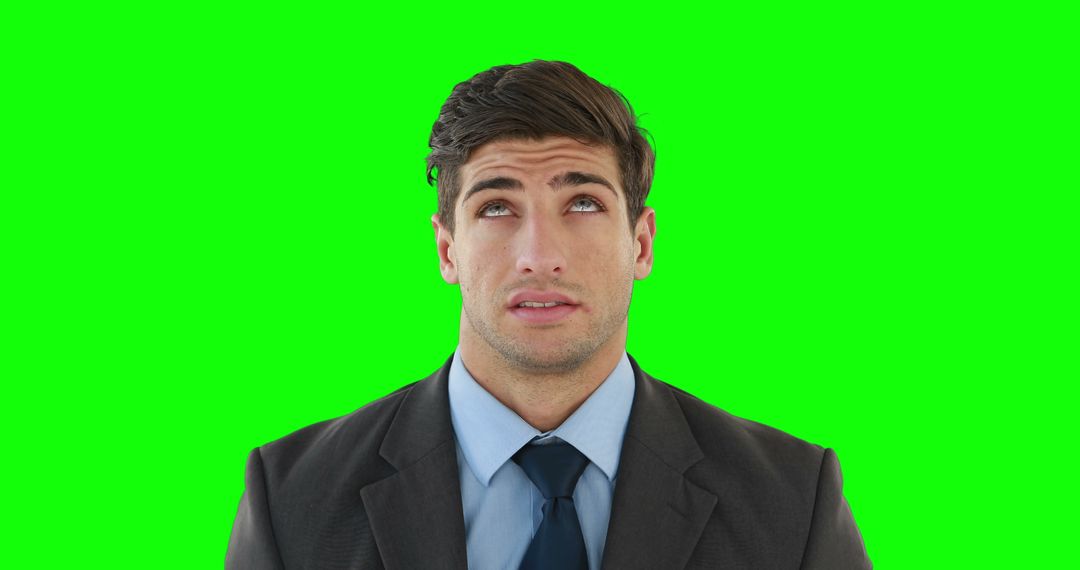 Businessman Rolling Eyes Against Green Screen - Free Images, Stock Photos and Pictures on Pikwizard.com