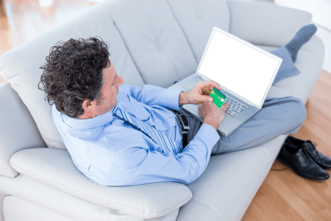 Transparent Online Shopping Businessman Relaxing on Couch with Laptop