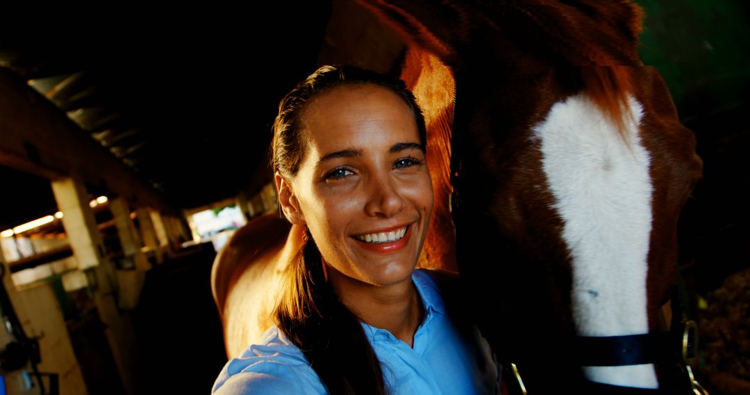 Smiling Woman Taking Selfie with Brown Horse in Stable - Free Images, Stock Photos and Pictures on Pikwizard.com