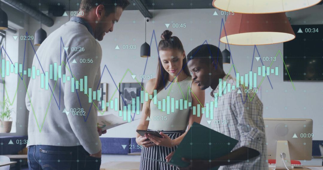 Diverse Team Analyzing Data with Digital Tools in Modern Office