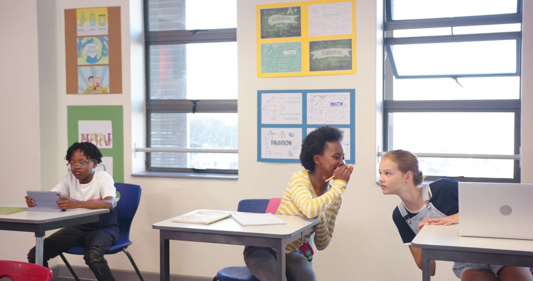 Diverse Students Engaging in Classroom Activities with Technology