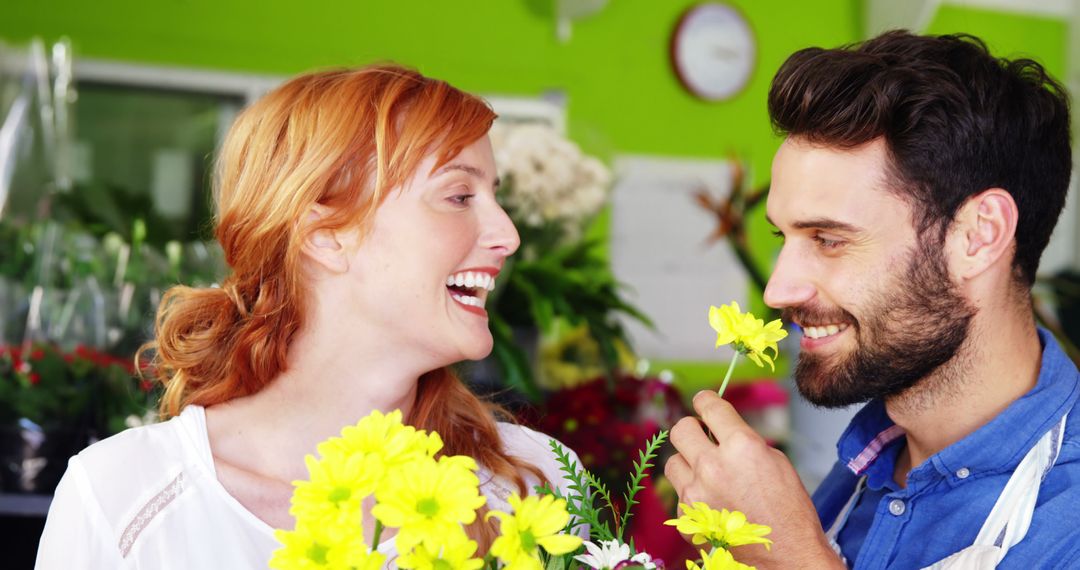 Couple Enjoying Fresh Flowers Together in Flower Shop - Free Images, Stock Photos and Pictures on Pikwizard.com