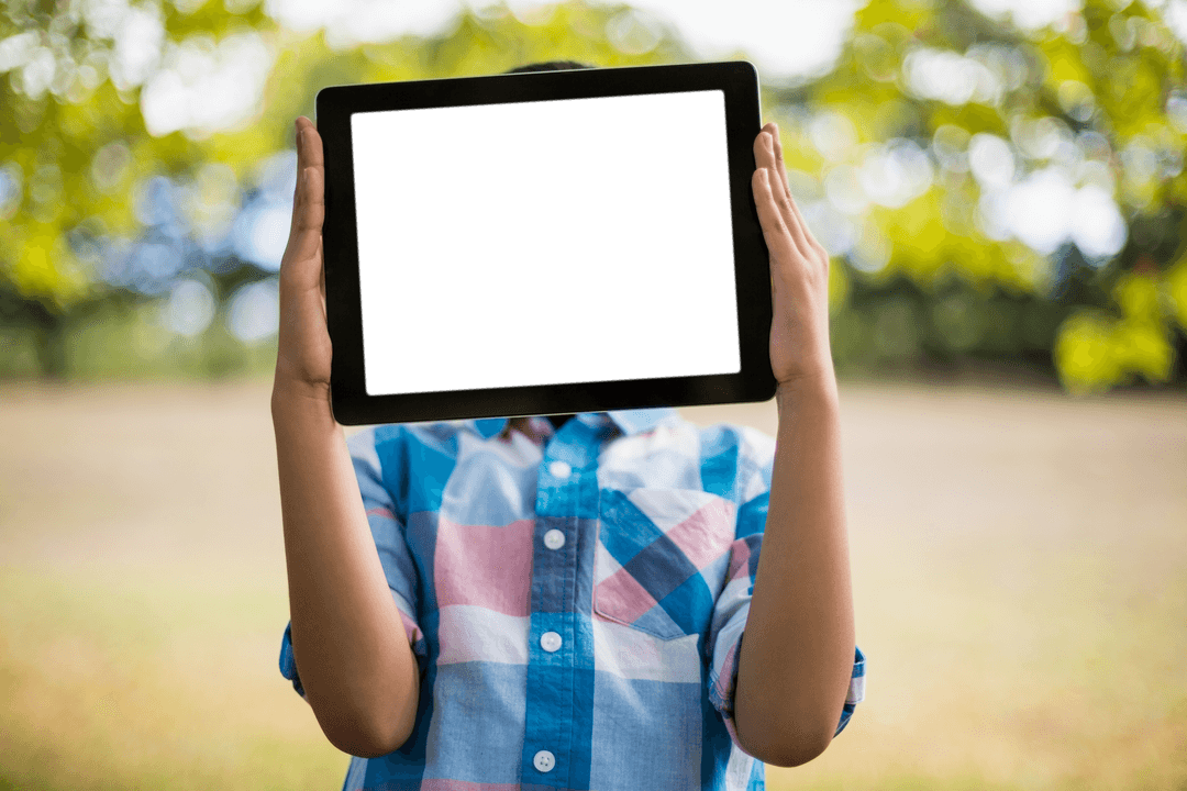 Child Holding Transparent Tablet Screen Outdoors
