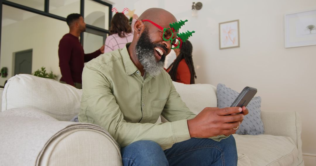 Diverse Group Joyful Home Gathering With Funny Glasses