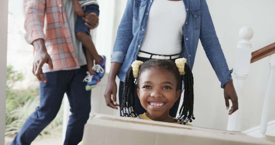 Happy African American Family Moving into New Home - Free Images, Stock Photos and Pictures on Pikwizard.com