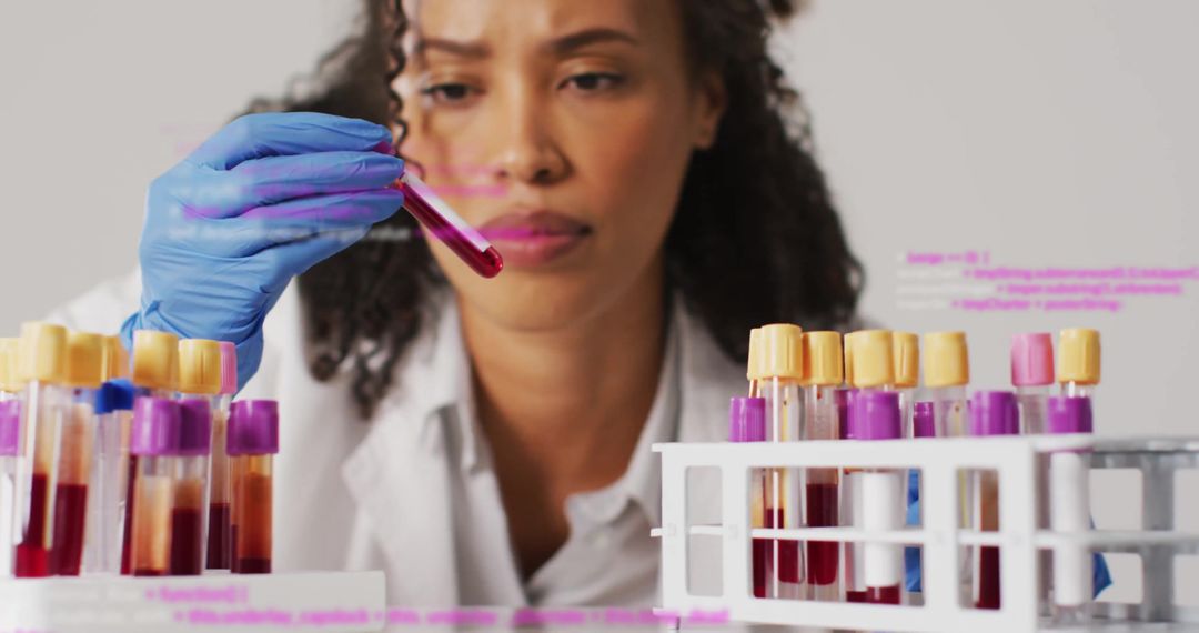 Scientist Analyzing Blood Sample with Digital Interface Overlay