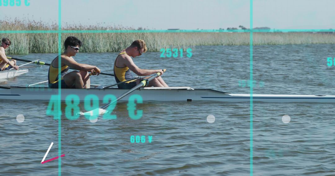 Rowing crew powering across lake in yellow singlets with teal data overlay