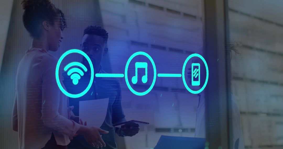 Diverse Coworkers Discussing Technology with Digital Icons Overlay