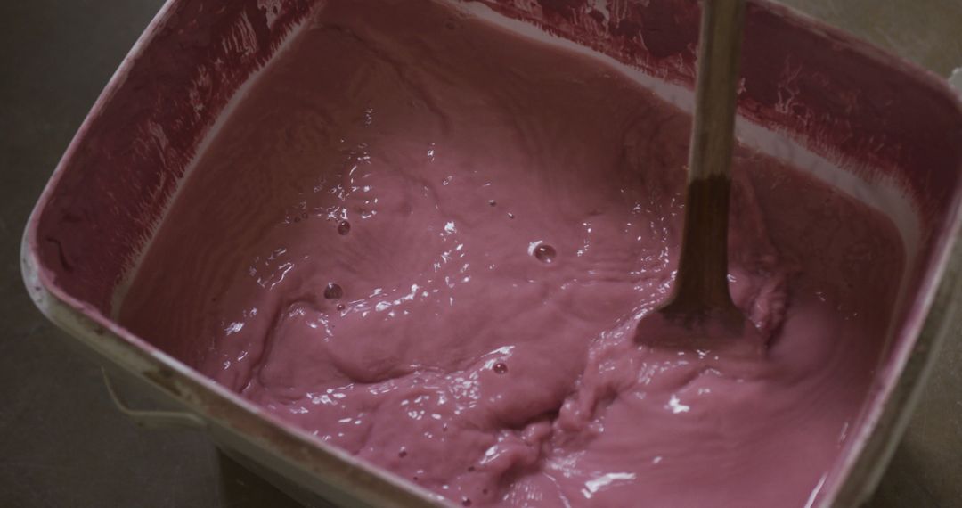 Mixing Pink Paint in Plastic Container with Stirrer - Free Images, Stock Photos and Pictures on Pikwizard.com