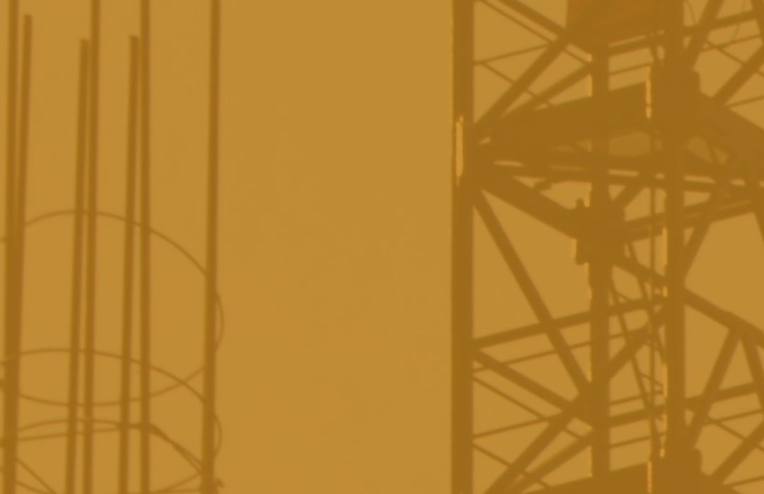 Industrial Construction Scaffolding Silhouette on Orange Background - Download Free Stock Templates Pikwizard.com