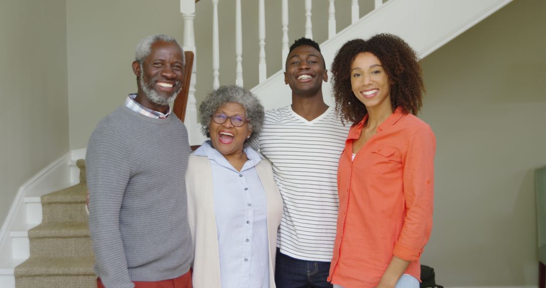 Happy African American Family Standing Together at Home - Free Images, Stock Photos and Pictures on Pikwizard.com