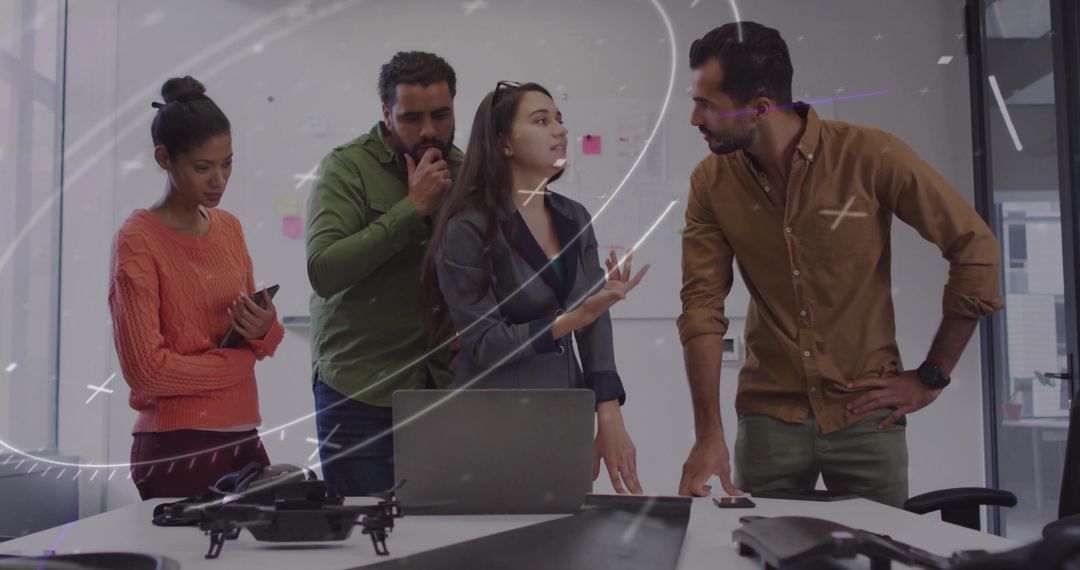 Diverse Team Discussing Innovative Tech in Modern Office