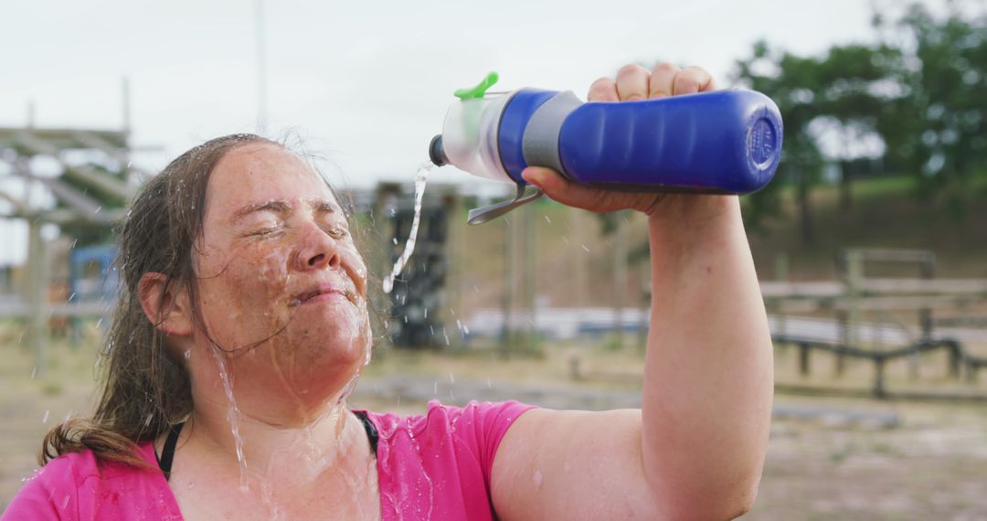 Woman Cooldown with Water after Outdoor Exercise - Free Images, Stock Photos and Pictures on Pikwizard.com