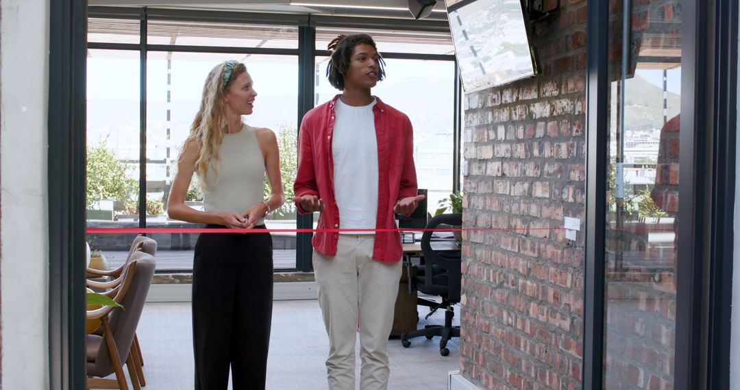 Colleagues Collaborating on Ideas in Open Office Space