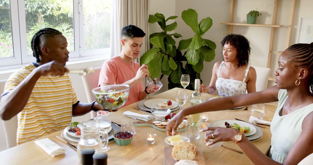 Diverse Group Friends Sharing Lively Dinner at Home Table