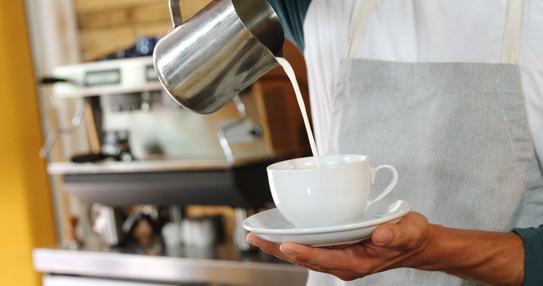 Barista Pouring Milk into Freshly Brewed Coffee Cup for Latte Art - Free Images, Stock Photos and Pictures on Pikwizard.com