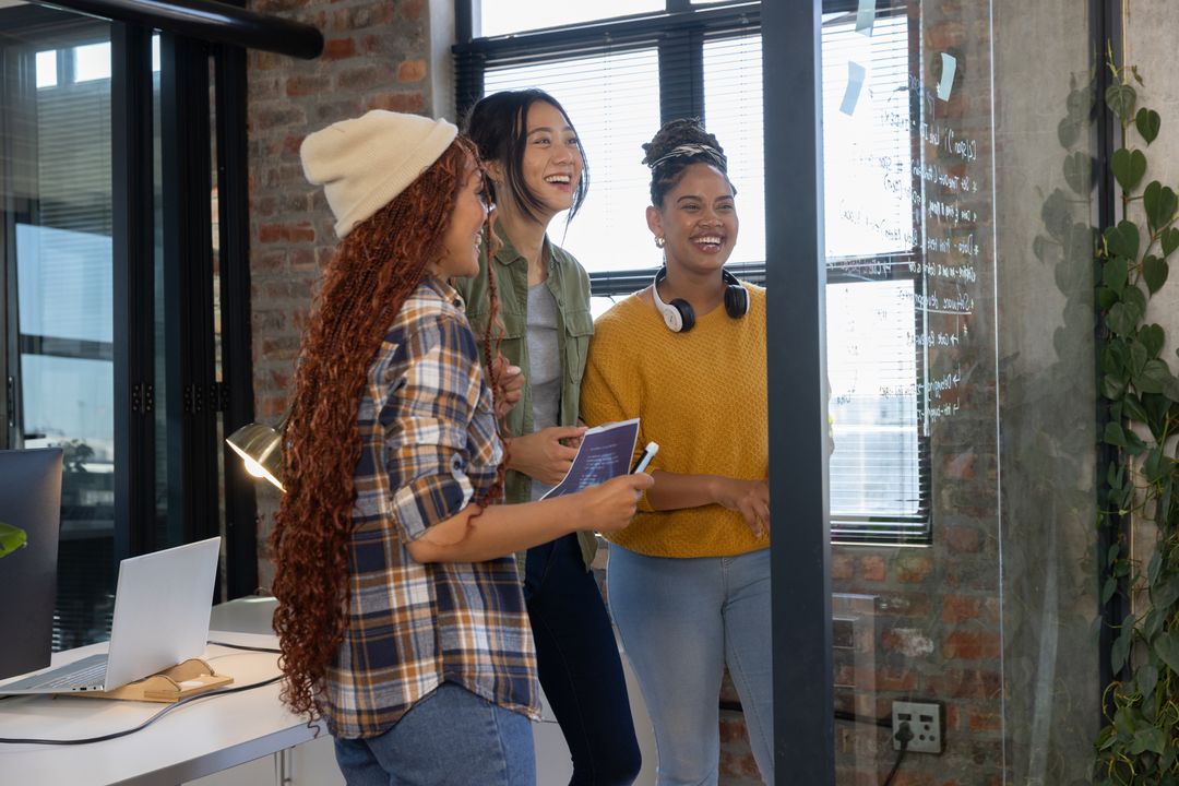 Diverse Team of Female Coworkers Collaborating