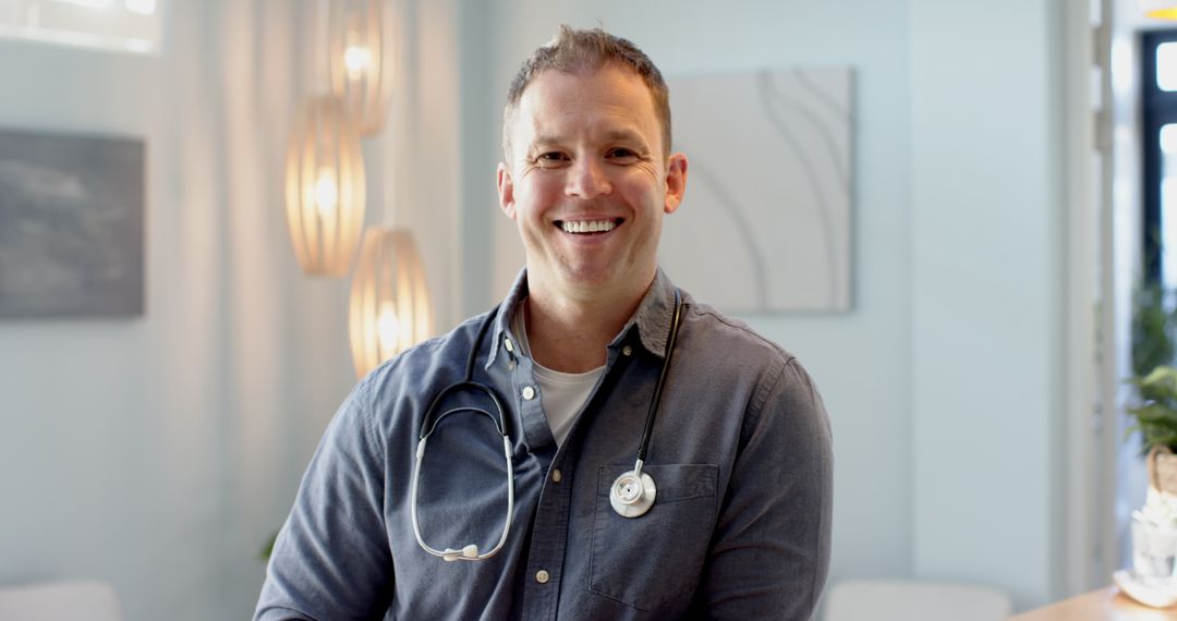 Doctor Smiling Confidently in Modern Consultation Room with Stethoscope