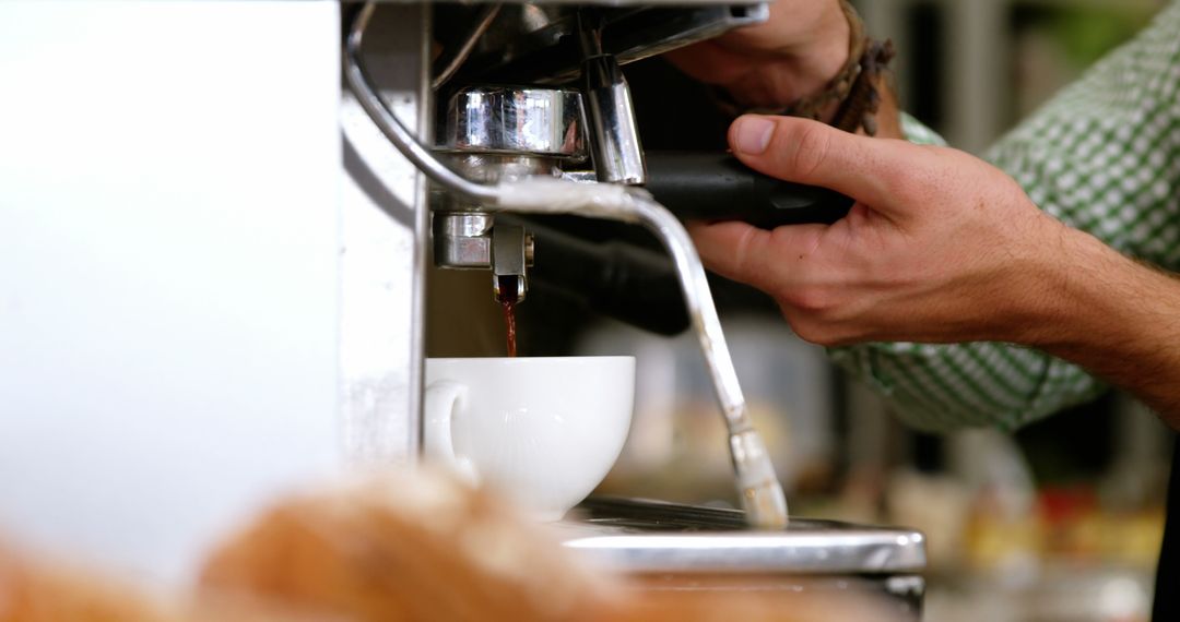 Barista Making Espresso with Professional Espresso Machine - Free Images, Stock Photos and Pictures on Pikwizard.com