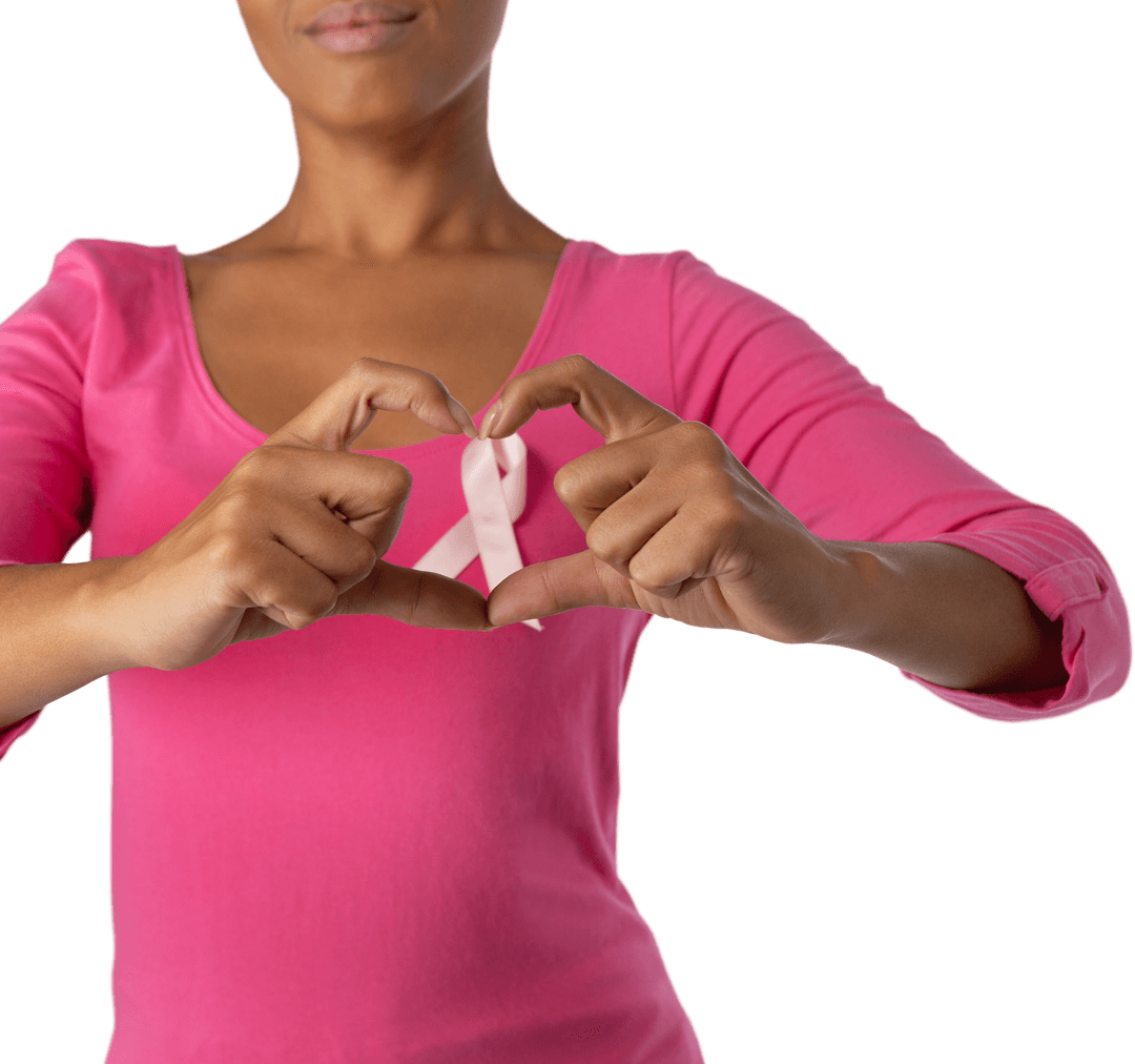 Woman in Pink Shirt Displaying Heart Sign with Pink Ribbon Support