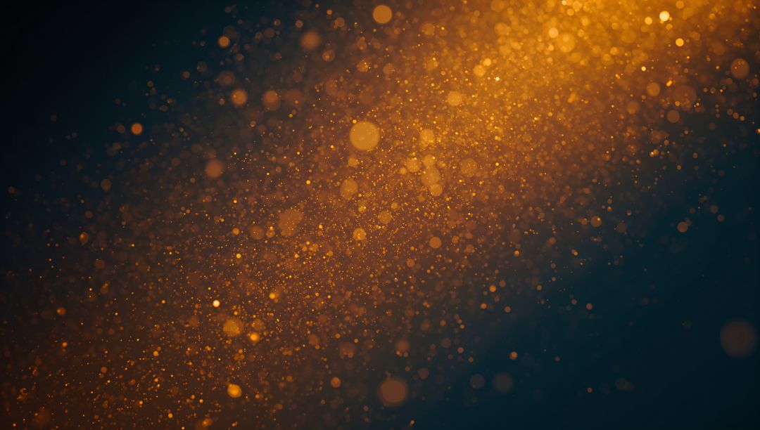 Golden Dust Particles in Radiant Amber Light