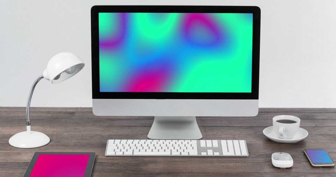 Modern Workspace with Colorful Abstract Screen Display