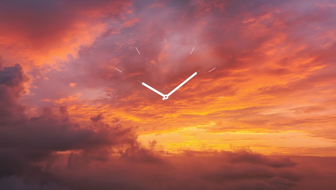 Analog Clock Overlay on Dramatic Sunset Sky