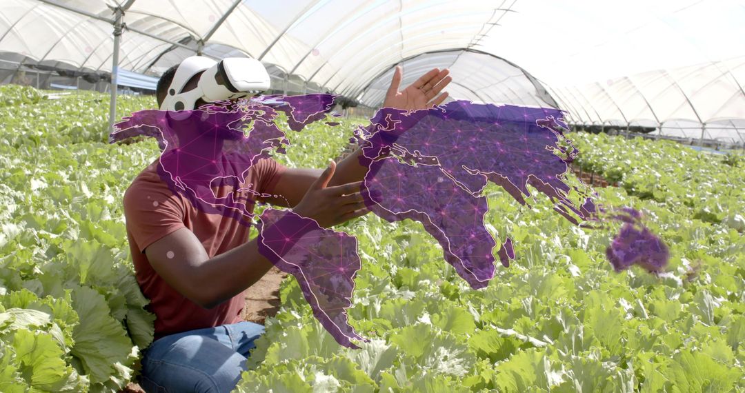 Man Using VR Technology in Greenhouse with Digital Map Projection
