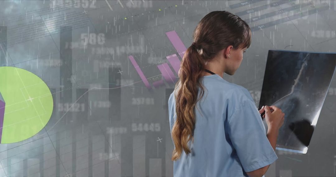 Female Doctor Analyzing X-Ray with Financial Data Visualization