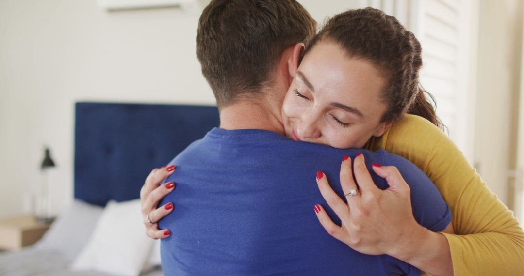 Joyful Couple Hugging at Home in Intimate Moment
