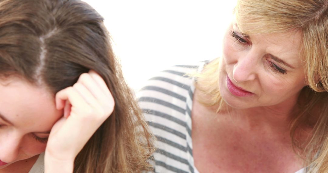 Caring Mother Comforting Sad Teen Daughter in Emotional Discussion - Free Images, Stock Photos and Pictures on Pikwizard.com