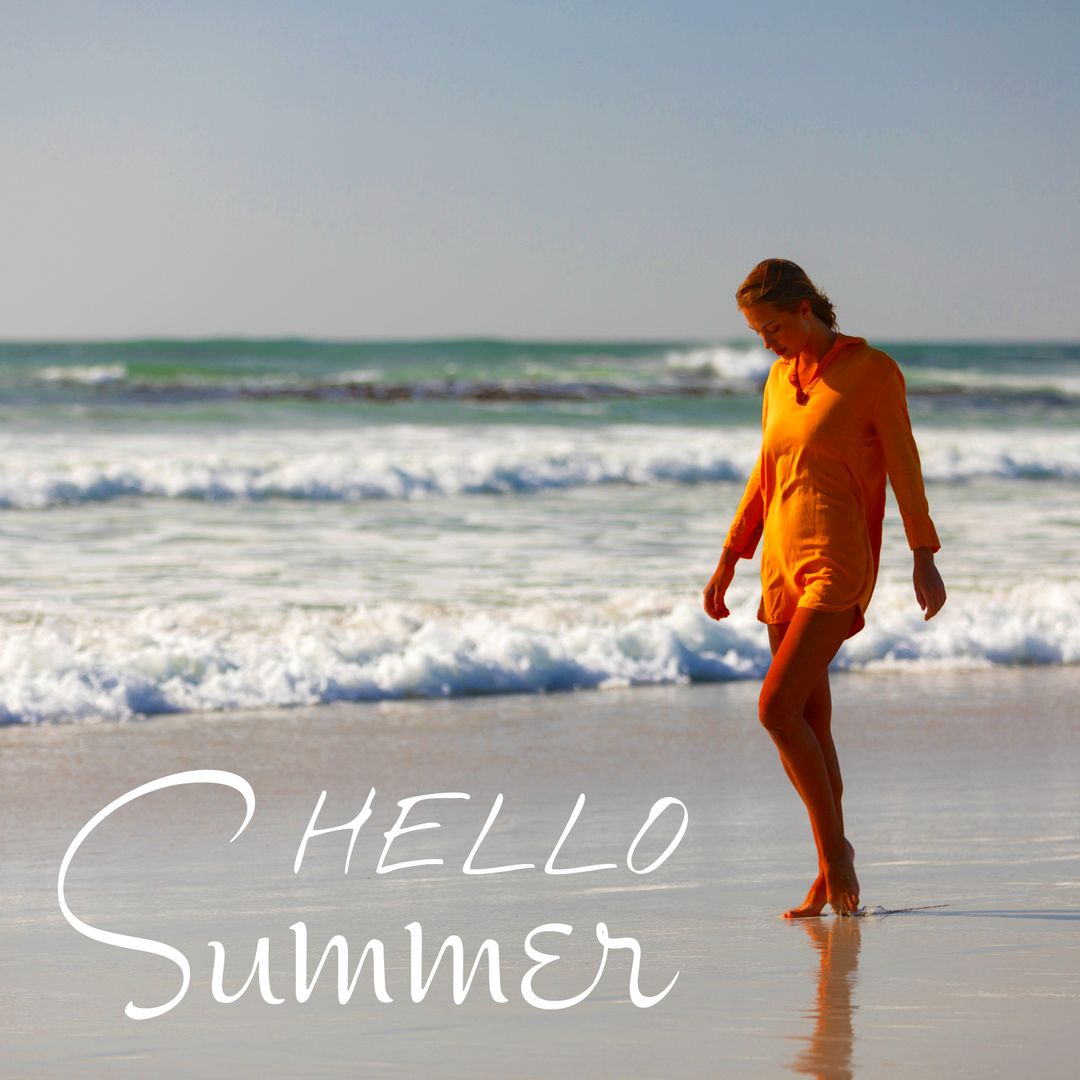 Woman Enjoying Solitude While Walking Along Beach Shoreline