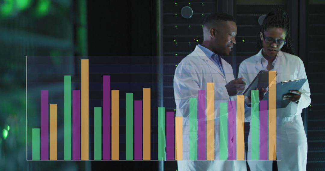 African American Scientists Analyzing Data in Server Room