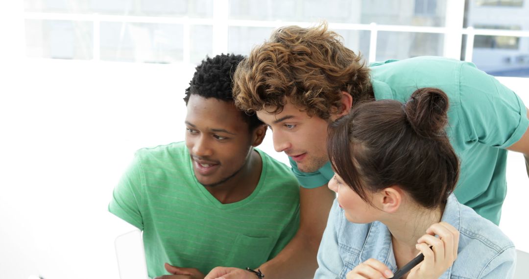 Team of Creative Designers Collaborating in Modern Office