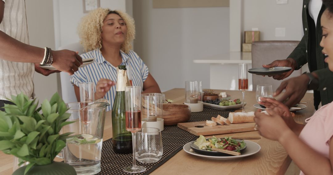 Friends Sharing Laughter and Snacks in Cozy Home Setting