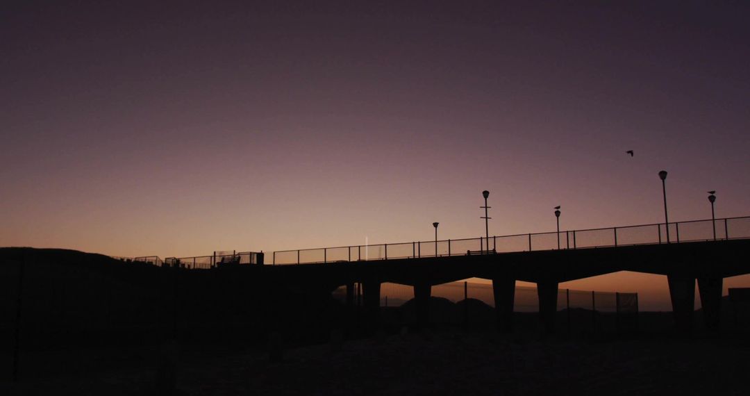 Minimalistic Coastal Pier Silhouette at Tranquil Dusk