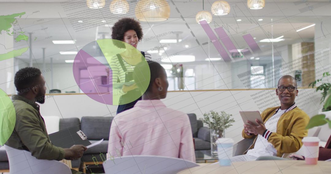 Colleagues Analyzing Data Visuals in Modern Office Environment