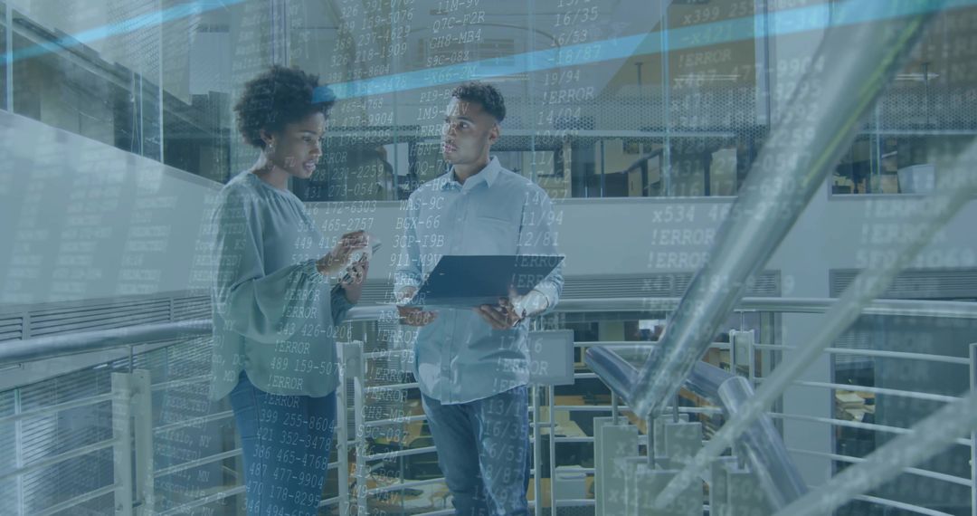 Colleagues Collaborating with Technology in Modern Corporate Environment