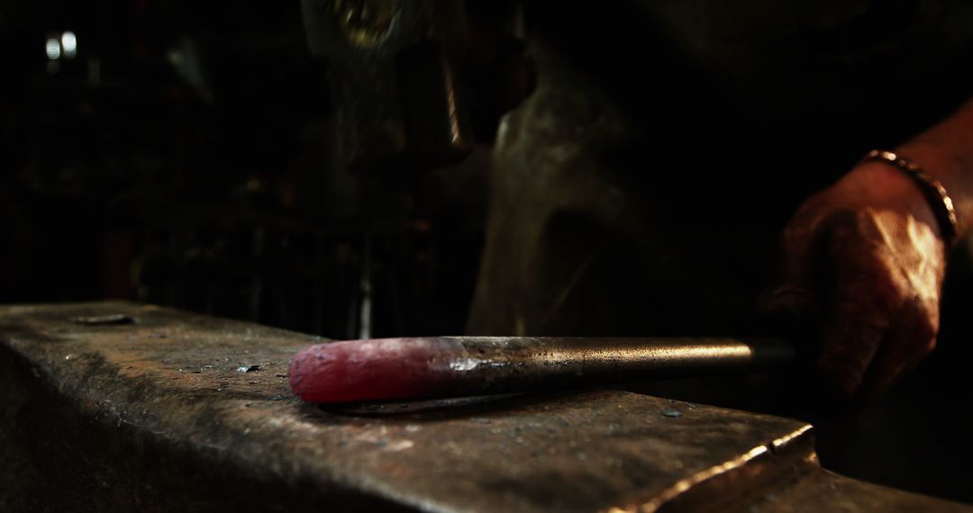 Close-Up of Blacksmith Forging Red-Hot Iron Rod on Anvil - Free Images, Stock Photos and Pictures on Pikwizard.com