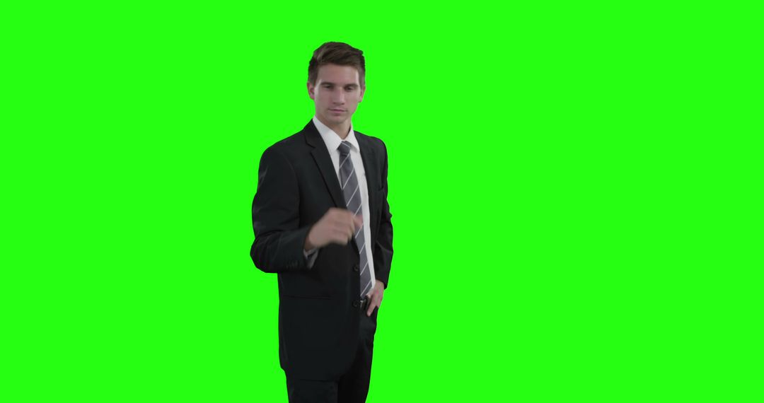 Businessman Posing Against Green Screen Background - Free Images, Stock Photos and Pictures on Pikwizard.com