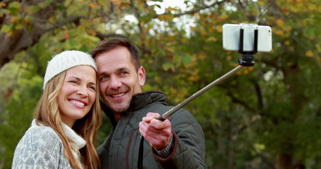 Happy Couple Taking Selfie in Autumn Park