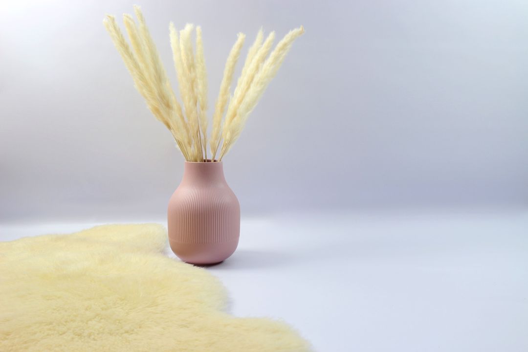 Minimalist Beige Vase with Dried Grass in Bright Room