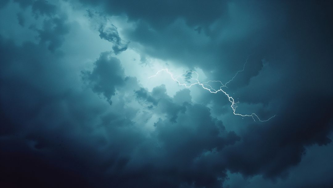 Jagged Lightning Against Dramatic Turbulent Night Sky