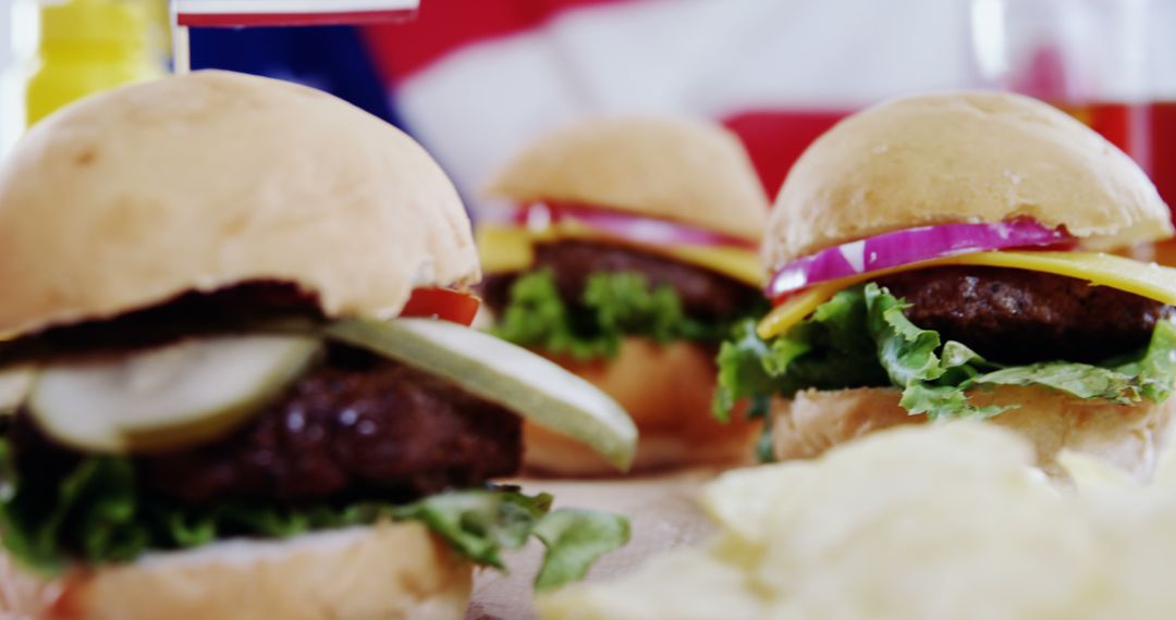 Appetizing Juicy Hamburgers with Fresh Toppings on Table